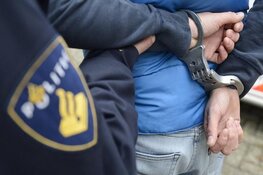 Schoten gelost op parkeerplaats; twee aanhoudingen